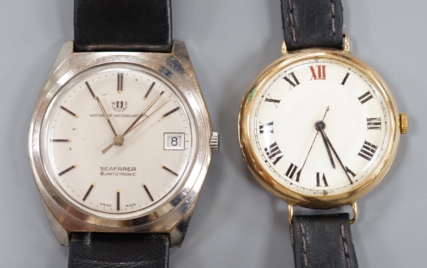 A gentleman's 1930' 9ct gold manual wind wrist watch, on a leather strap, 27.5 grams and a similar stainless steel Watches of Switzerland Seafarer Quartztronic watch.